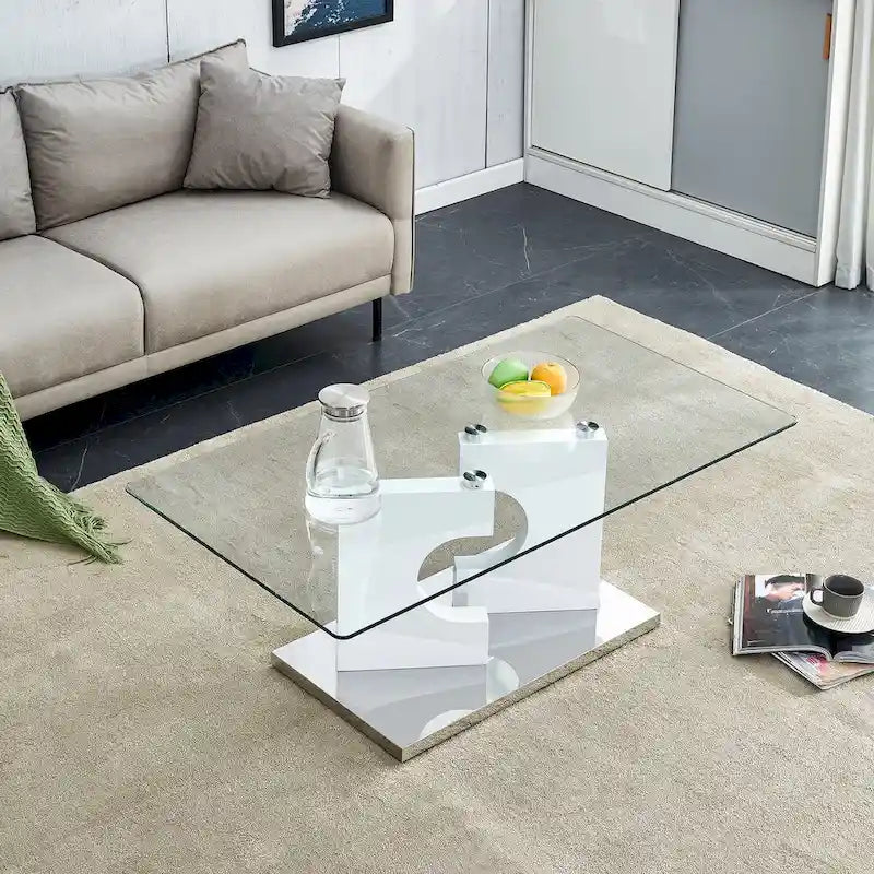 A rectangular modern and fashionable coffee table with tempered glass tabletop and white MDF legs